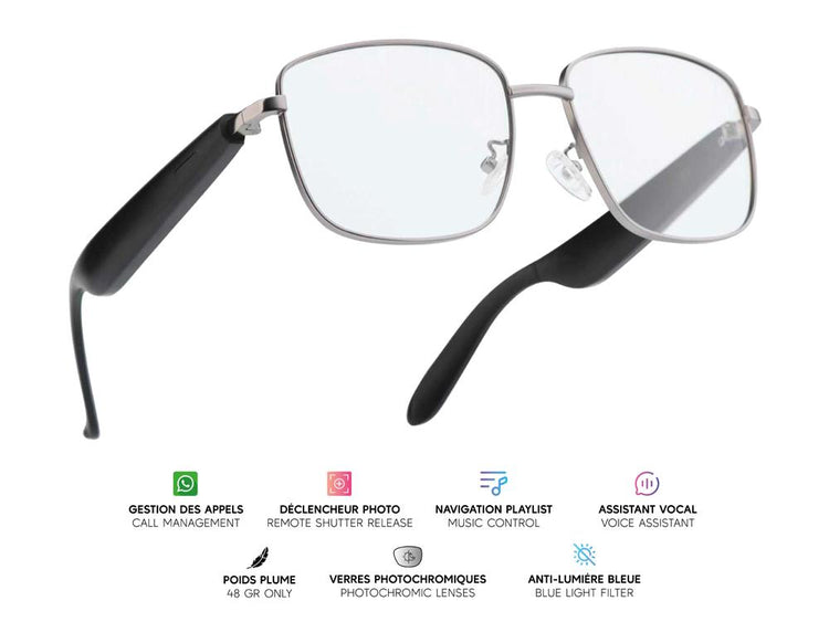 "Lunettes connectées Mogie. - Modèle Lyra - Branches noires avec verres photochromiques.- Branche tactile - Gestion playlist et appels - Bluetooth - Assistant vocal - Anti lumière bleue - Monture : Grise métalisée mate"