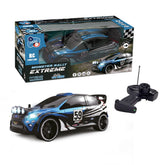 TACHAN R/C Voiture de rallye extrême radiocommandée Échelle : 1:16 2,4 GHz 28cm x 11cm x 14cm Couleur Bleu Noir