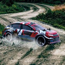 TACHAN R/C Voiture de rallye extrême radiocommandée Échelle : 1:16 2,4 GHz 28cm x 11cm x 14cm Couleur Rouge Noir
